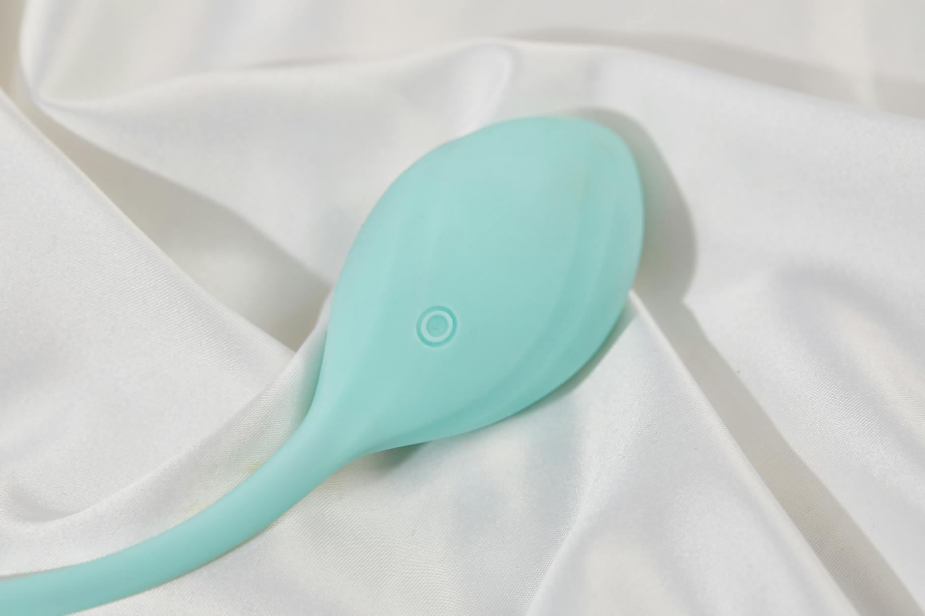 A lemon-colored silicone vibrator on a bright yellow background, symbolizing approachable pleasure.